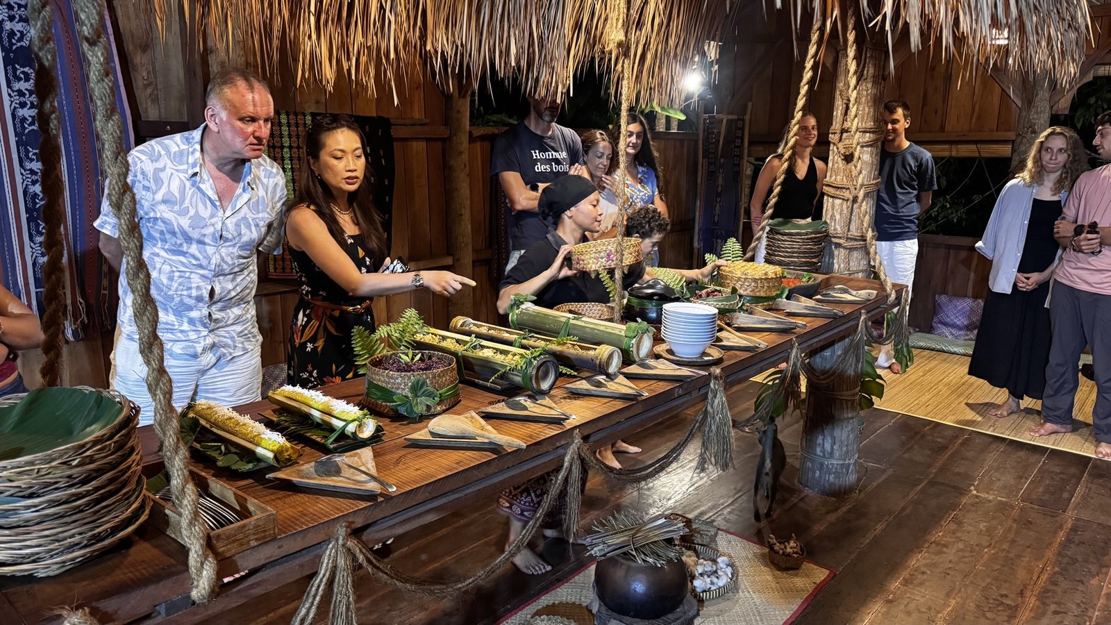 Trade Rate Sheet - Dapur Tara 2 Guests gathered around the long table as the dishes are introduced